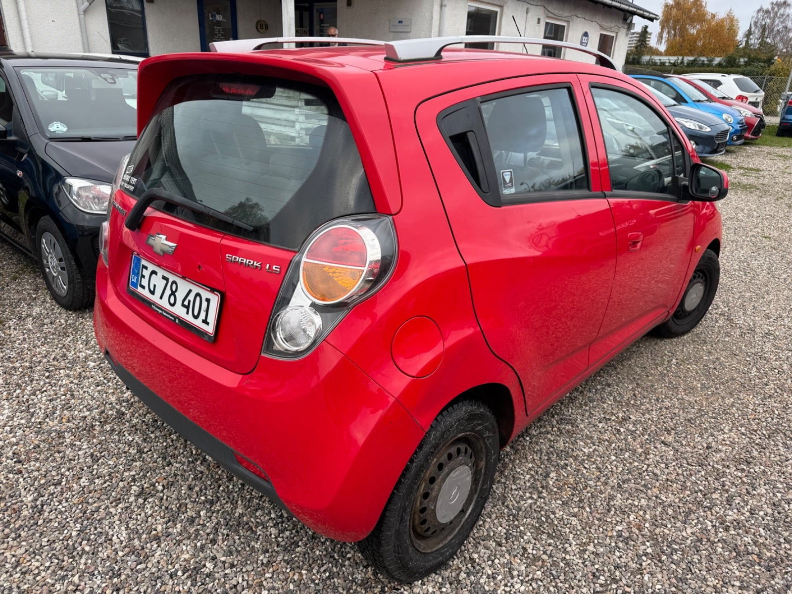 Rød Chevrolet Spark fra 2011