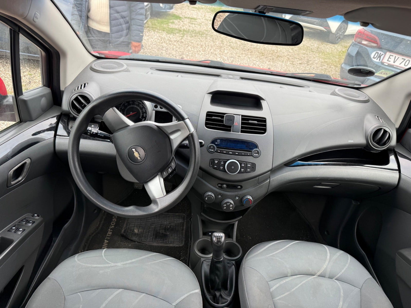 Rød Chevrolet Spark fra 2011