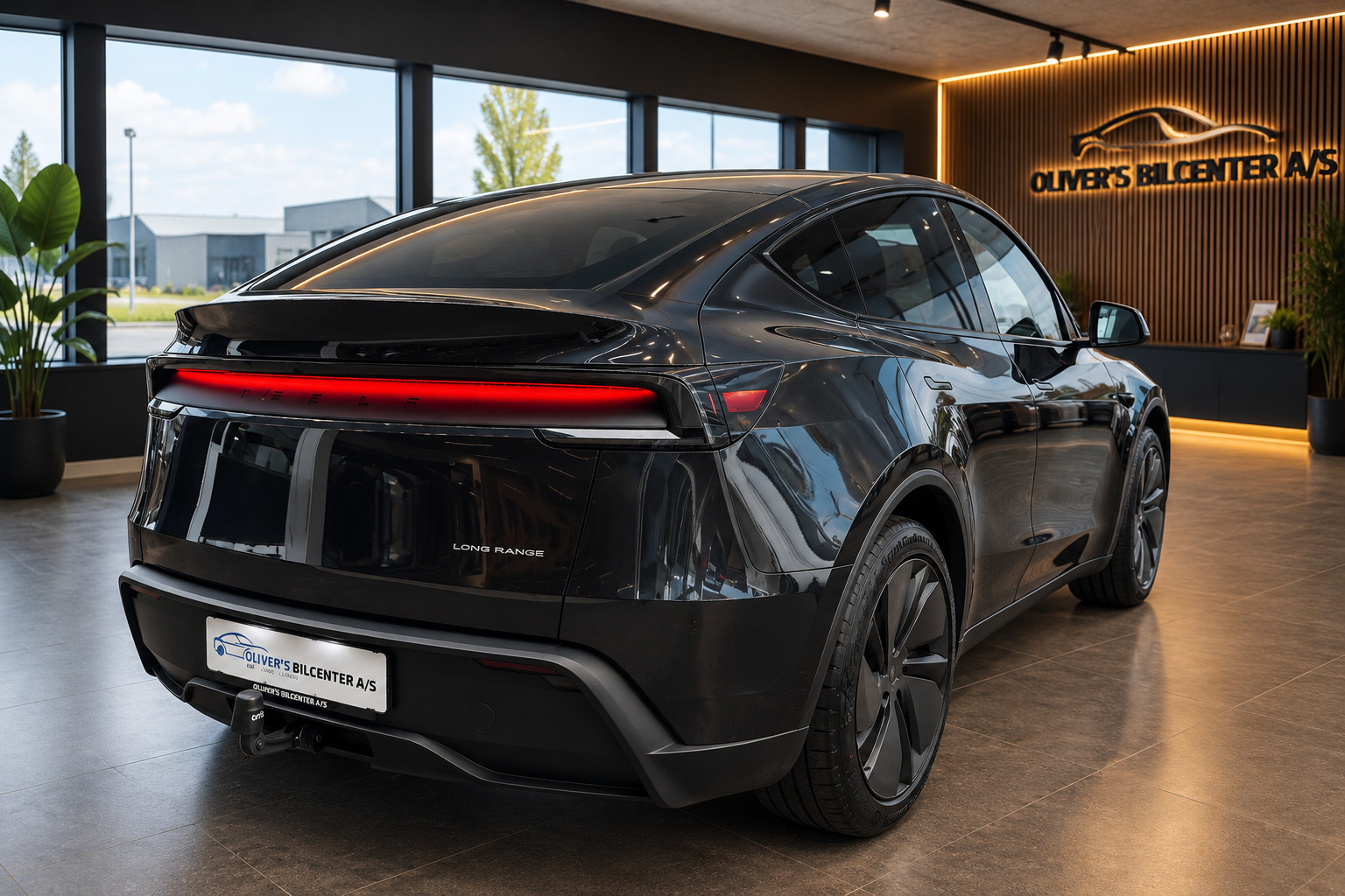 Grå Tesla Model Y fra 2026