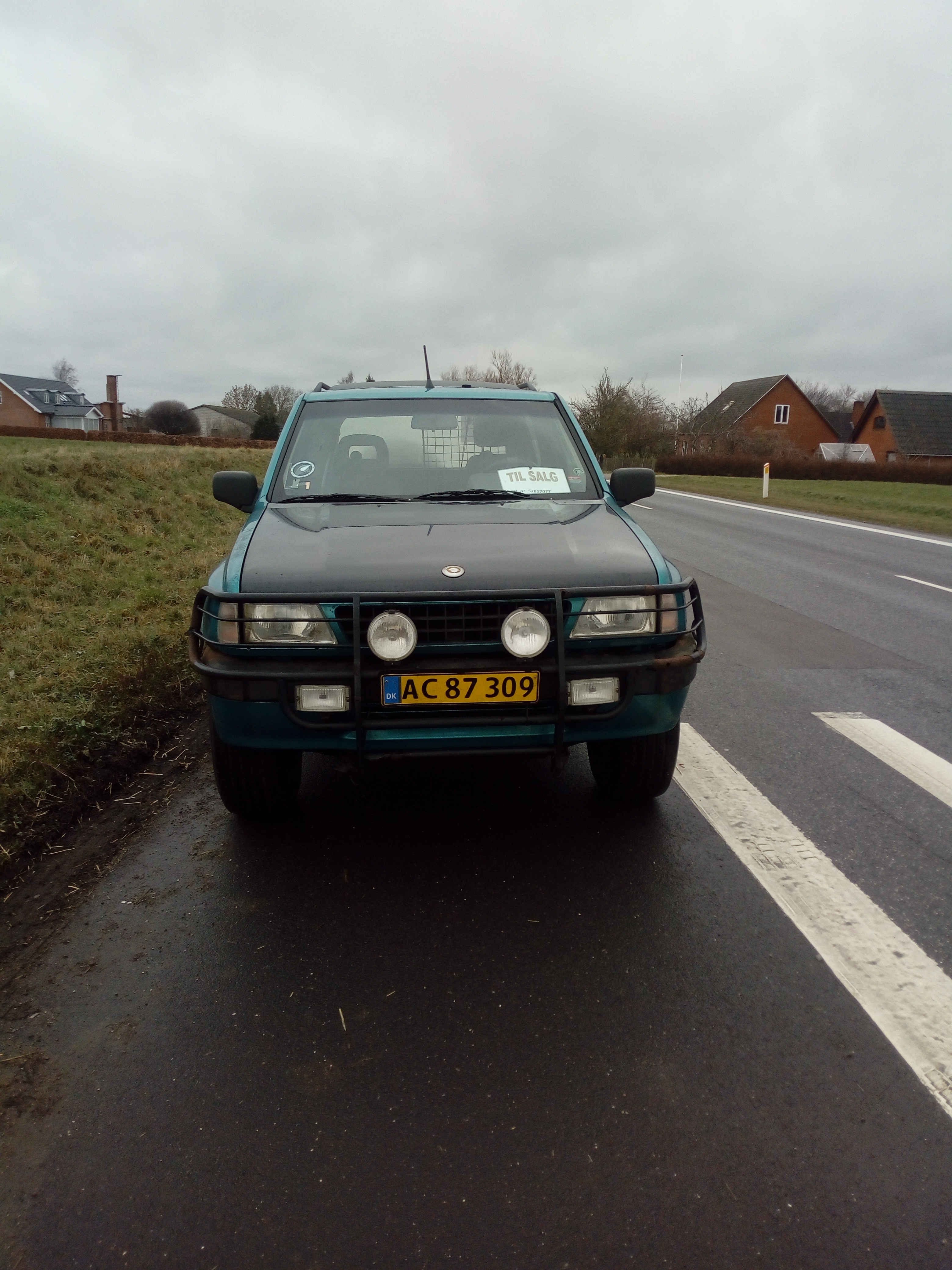 Grøn Opel Frontera fra 1994