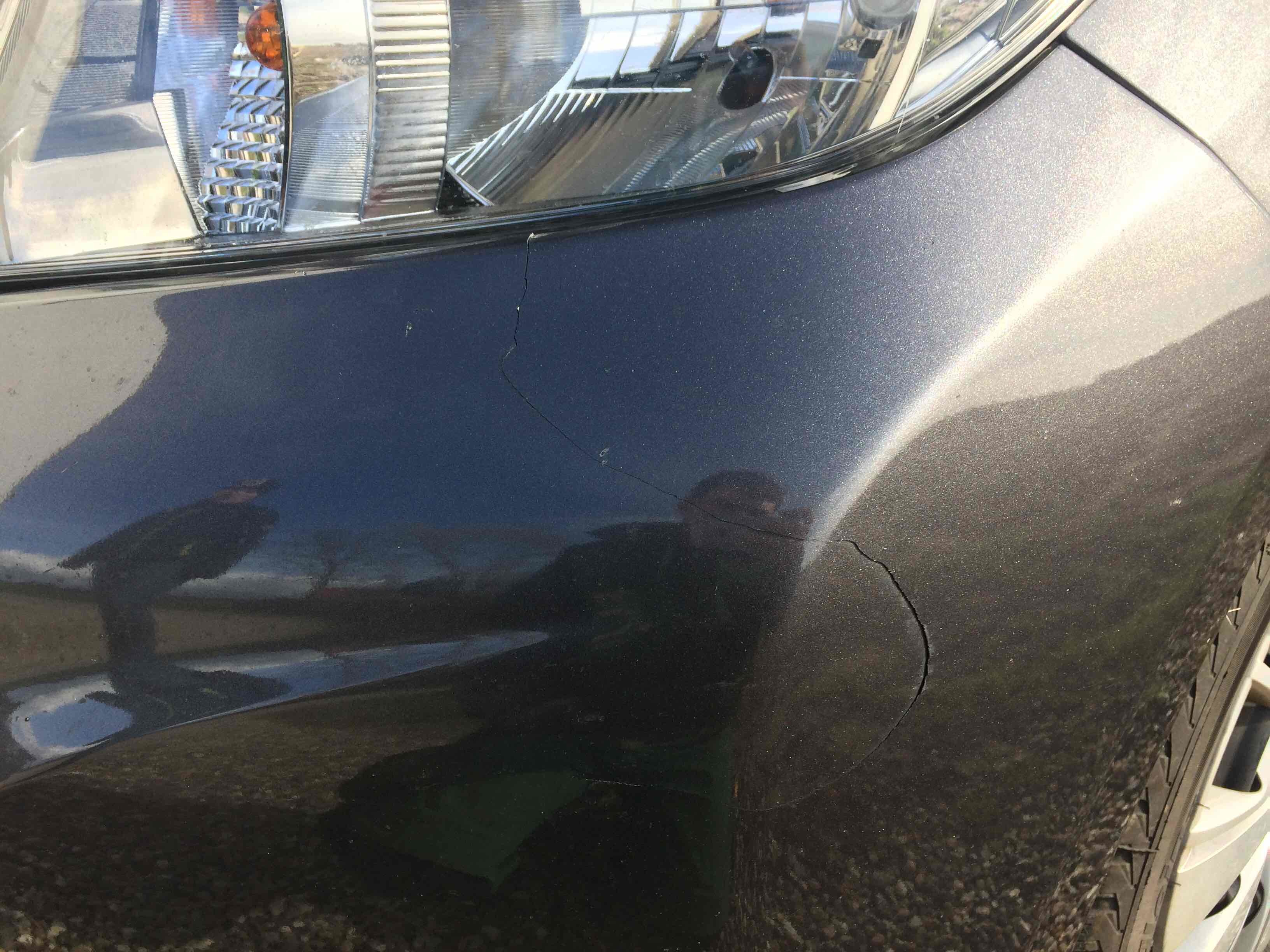 Grå Toyota Yaris fra 2014
