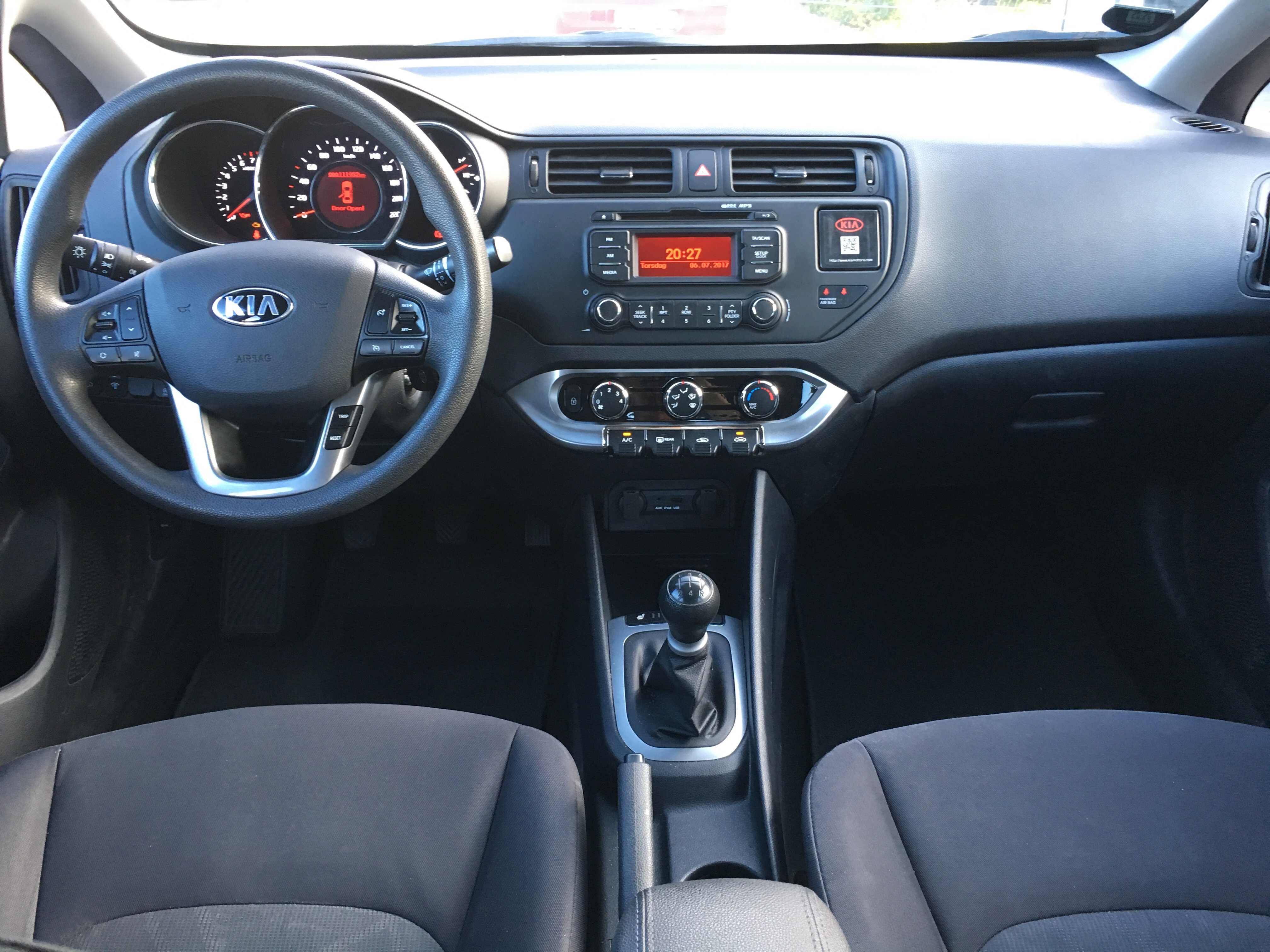 Grå Kia Rio fra 2013