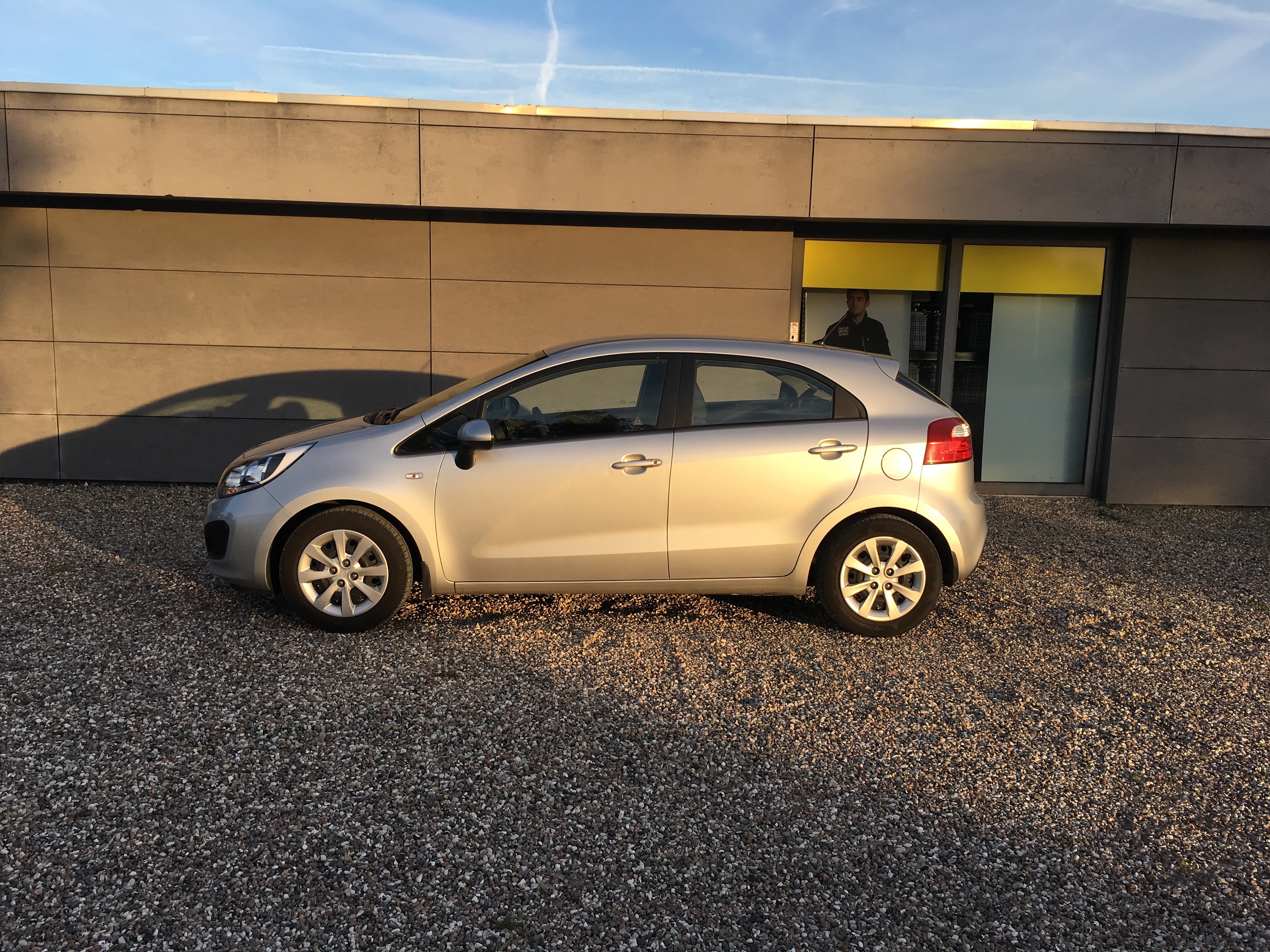Grå Kia Rio fra 2013