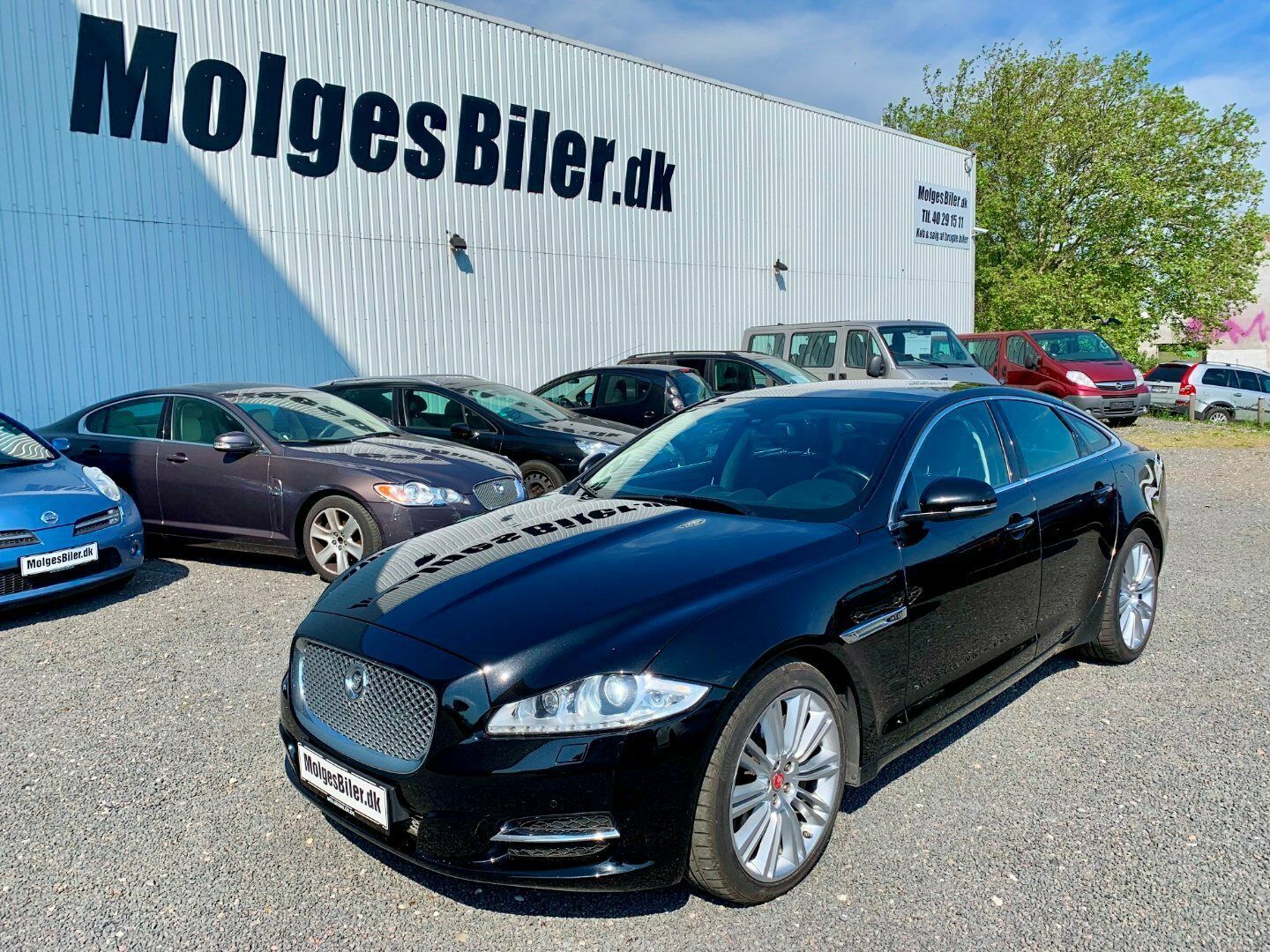 Grå Jaguar XJ fra 2013