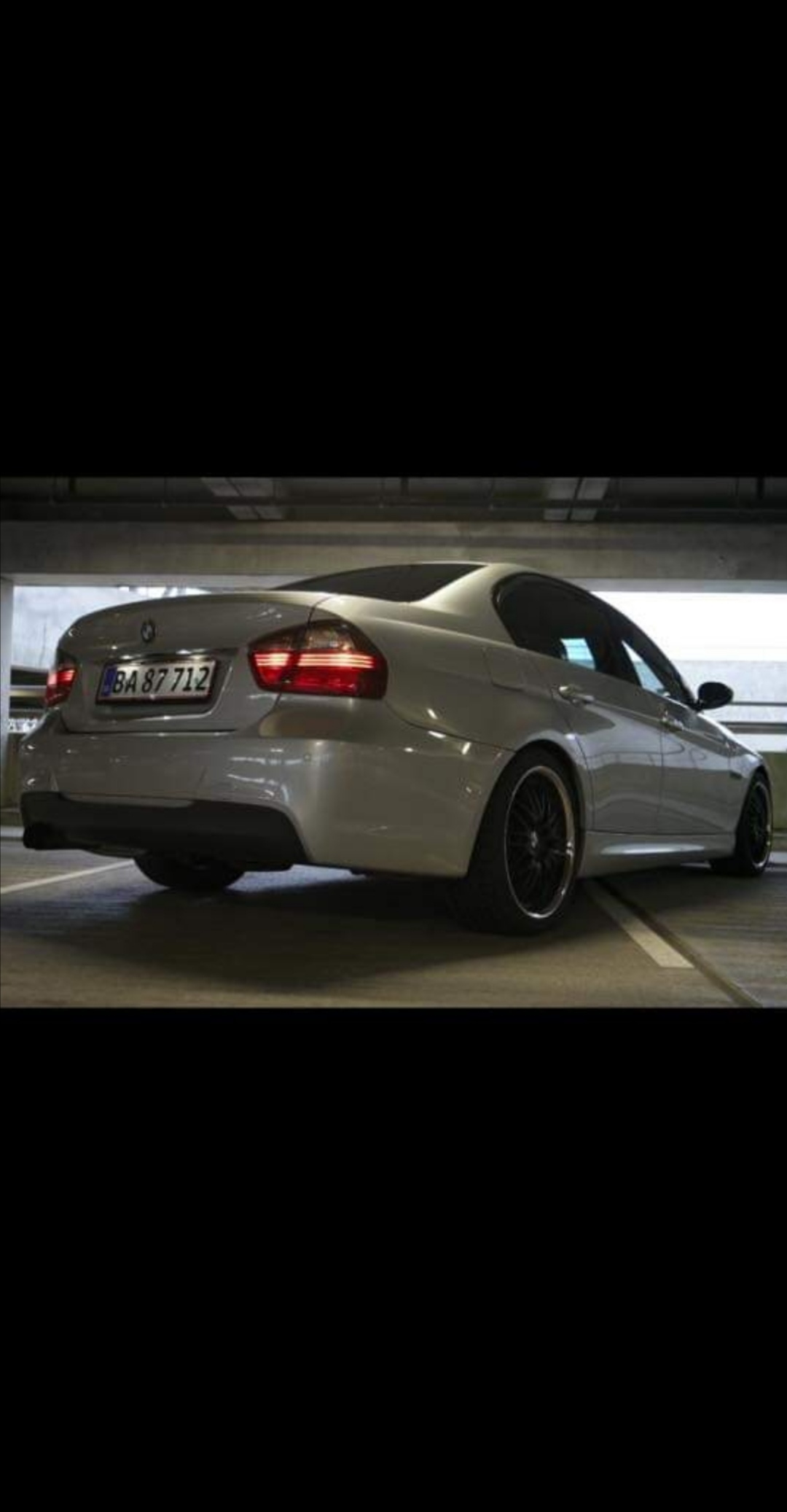 Sølv BMW 318 fra 2008