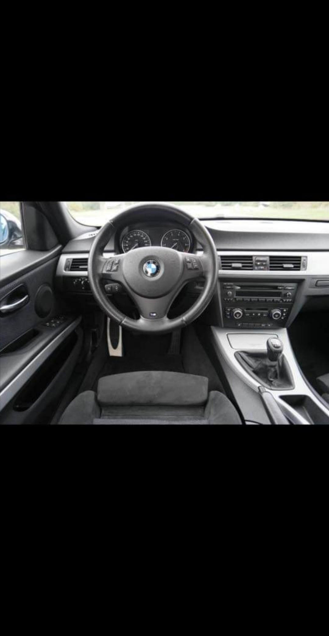 Sølv BMW 318 fra 2008
