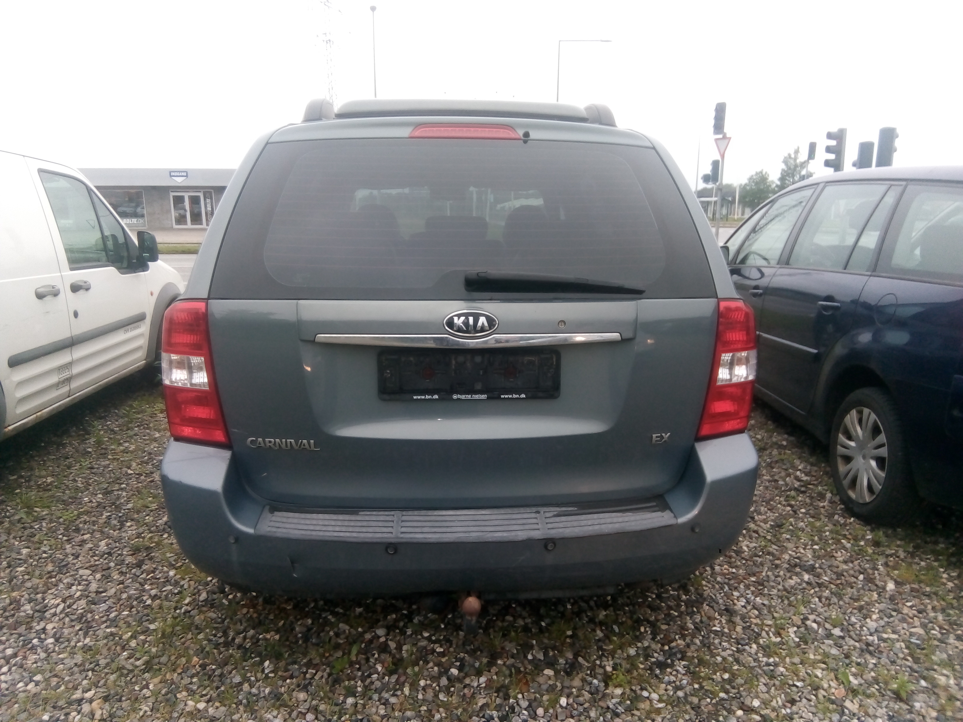Grå Kia Carnival fra 2007