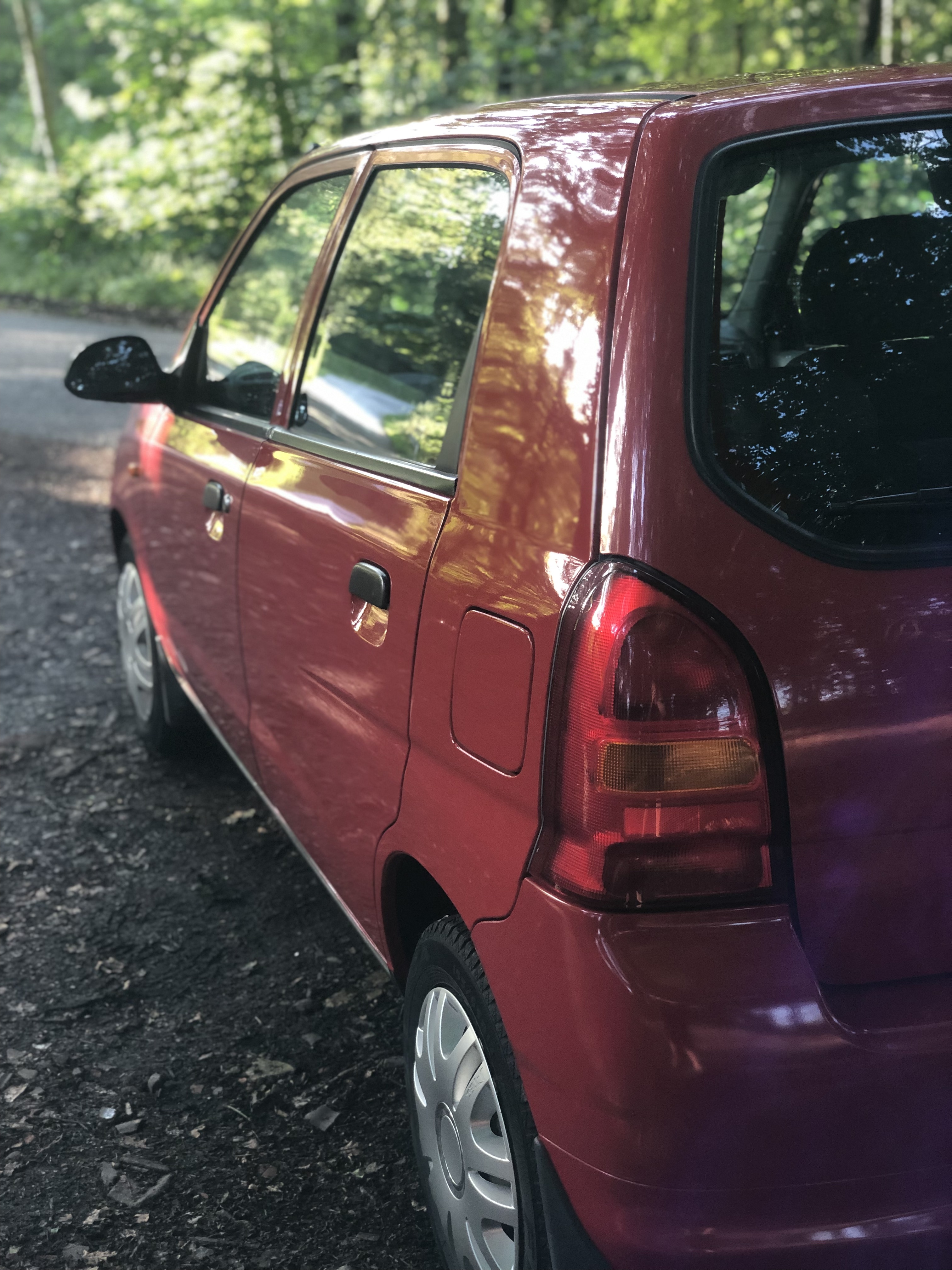 Rød Suzuki Alto fra 2005