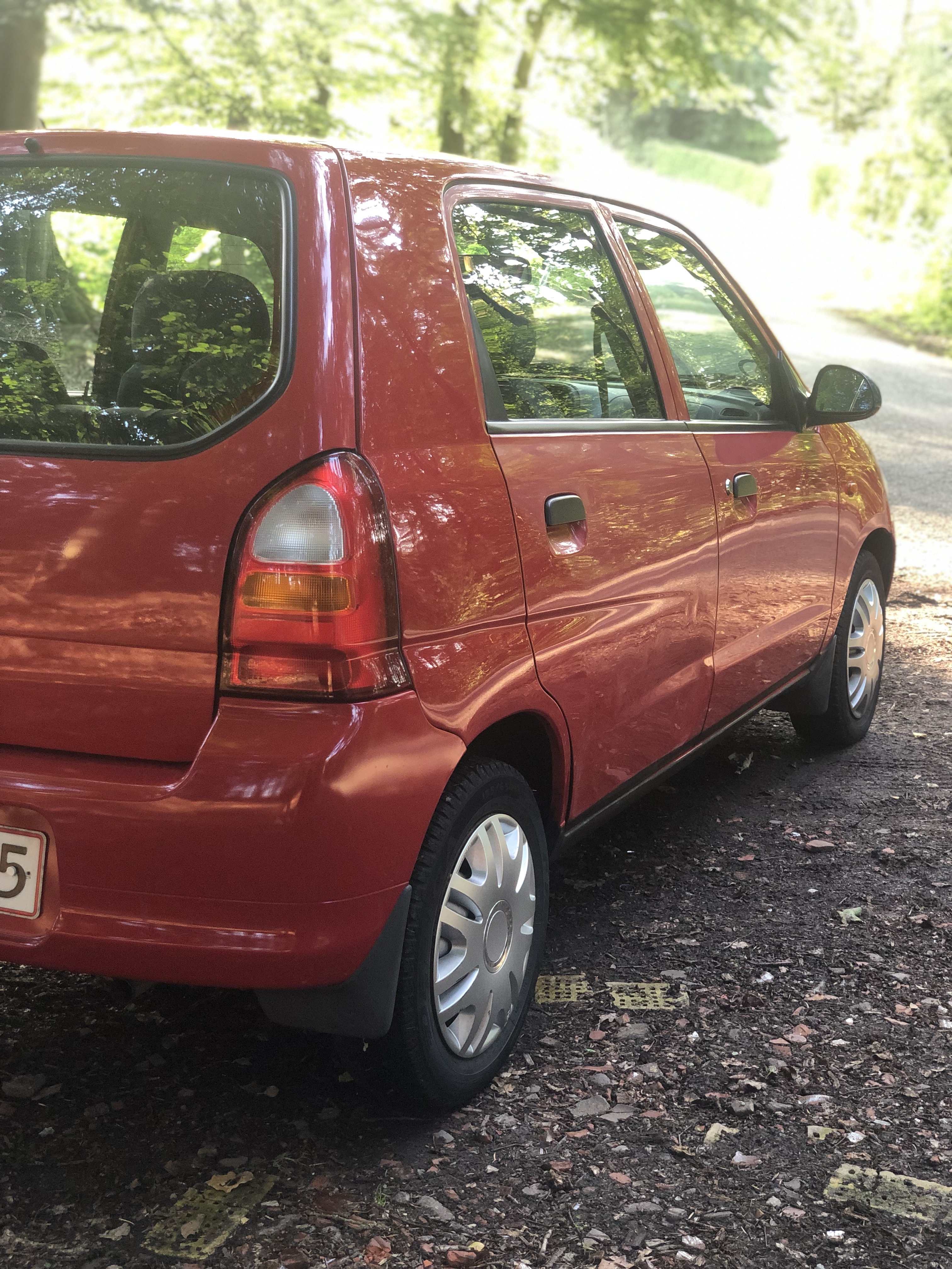 Rød Suzuki Alto fra 2005