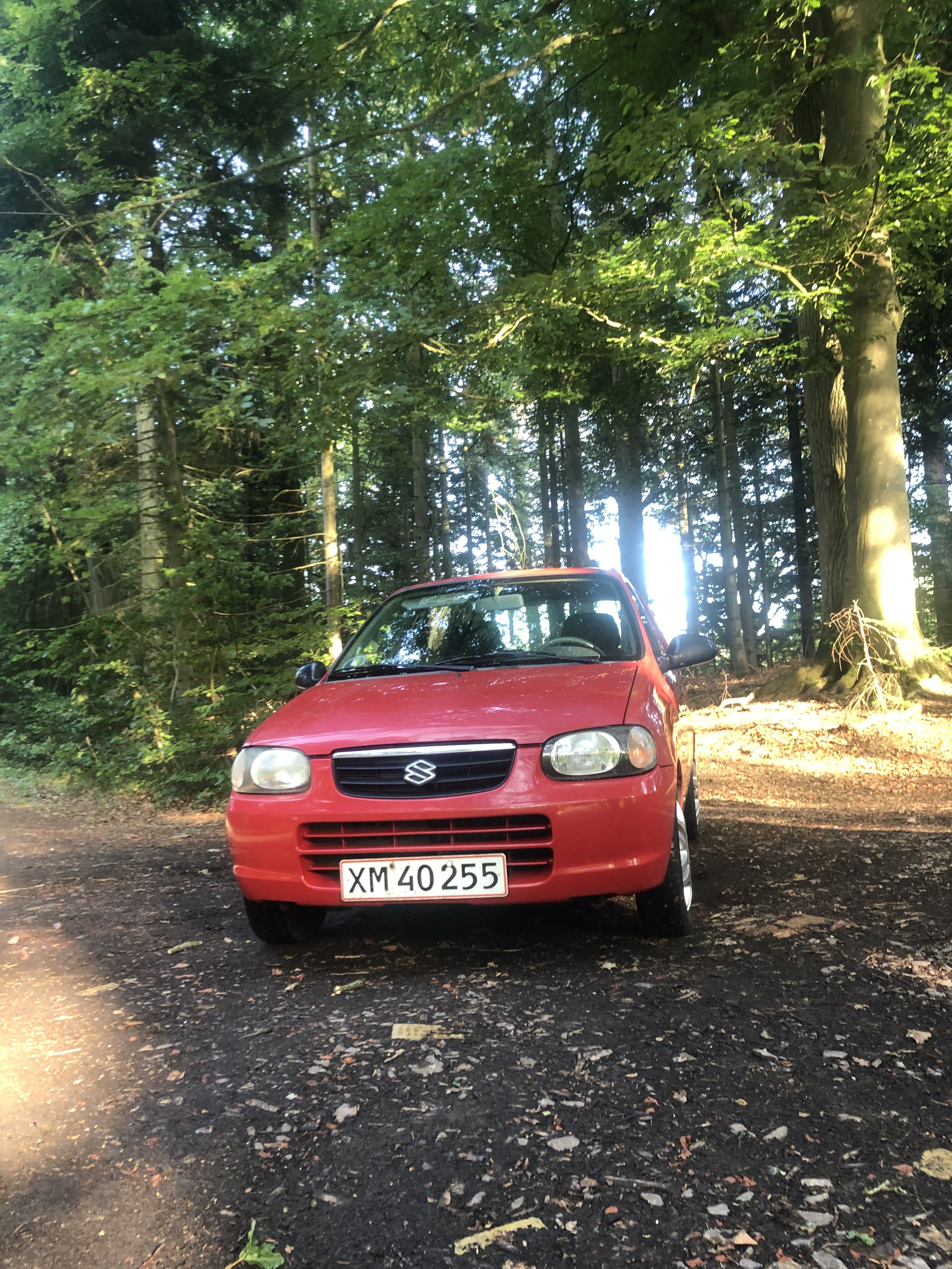 Rød Suzuki Alto fra 2005