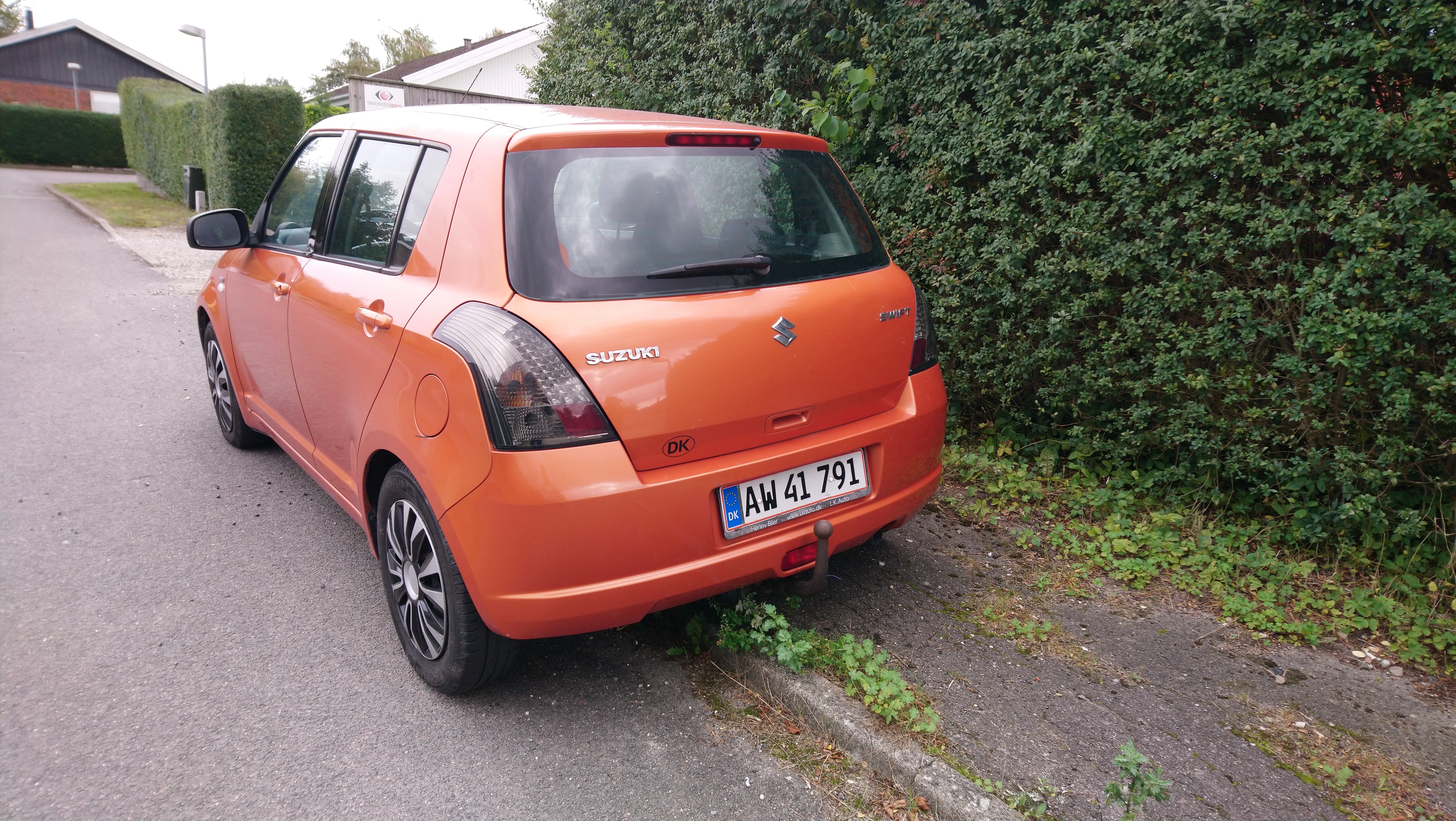 Orange Suzuki Swift fra 2005