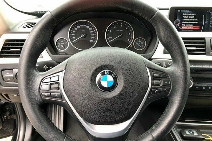 Sort BMW 320d fra 2014